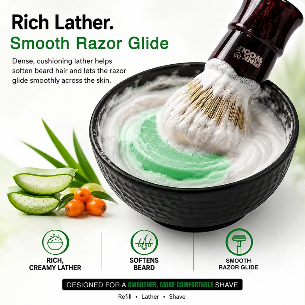 Seabuckthorn & Aloe Vera shaving soap refill being lathered in a bowl with a maroon shaving brush.