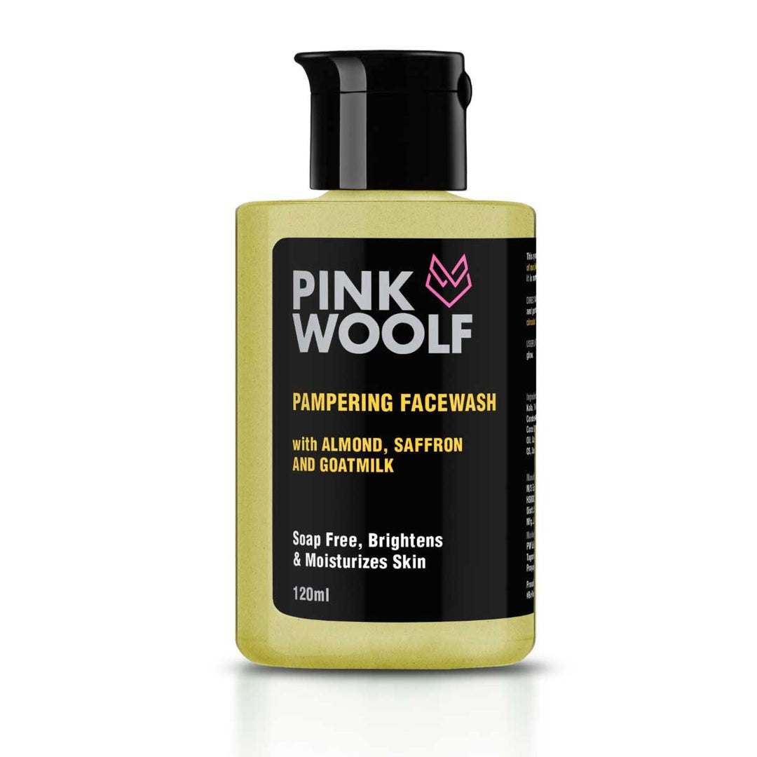 Pink Woolf pampering face wash bottle on a white background