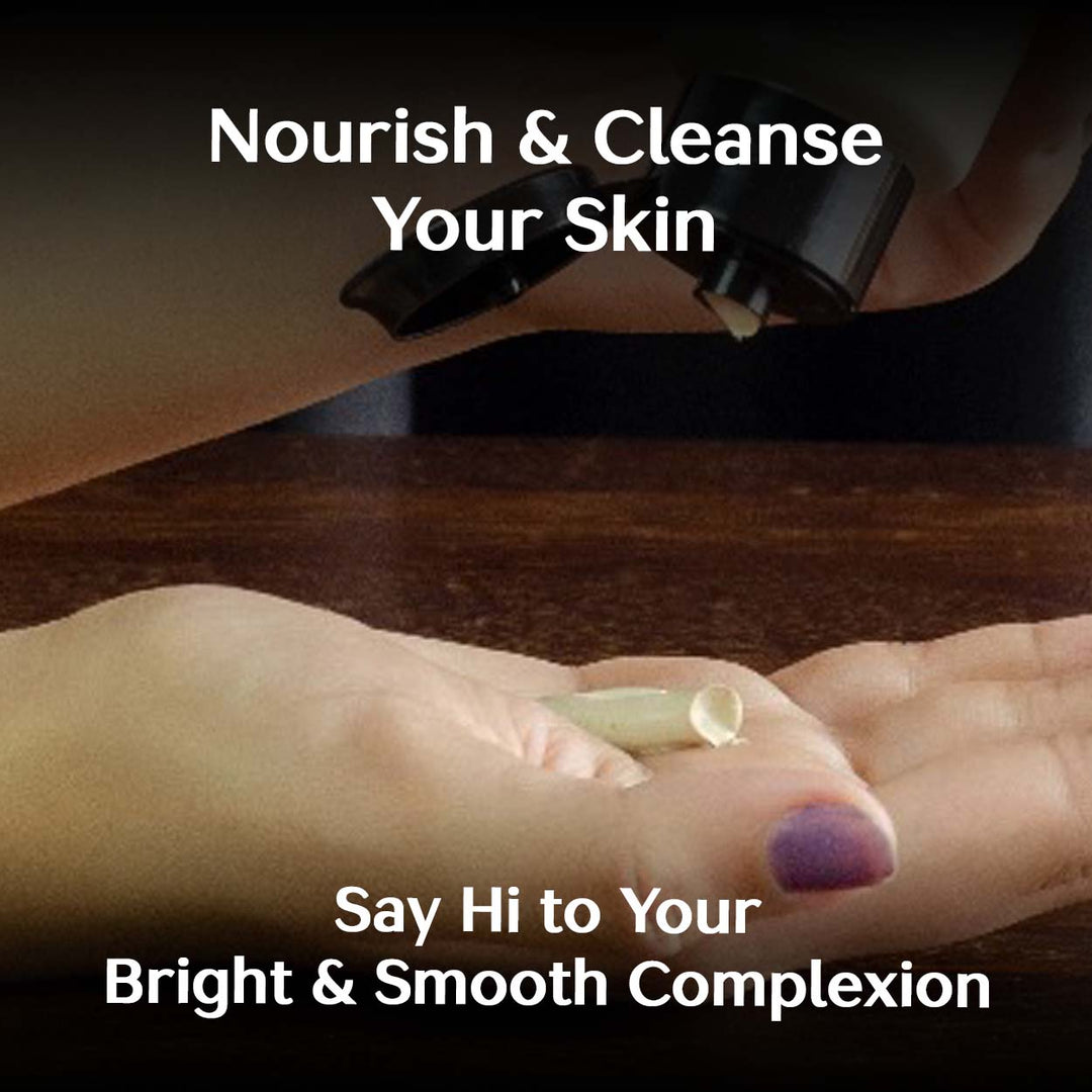 A woman applying the pampering almond saffron goatmilk face wash to their hand with text about skin care - say hi to bright & smooth complexion.