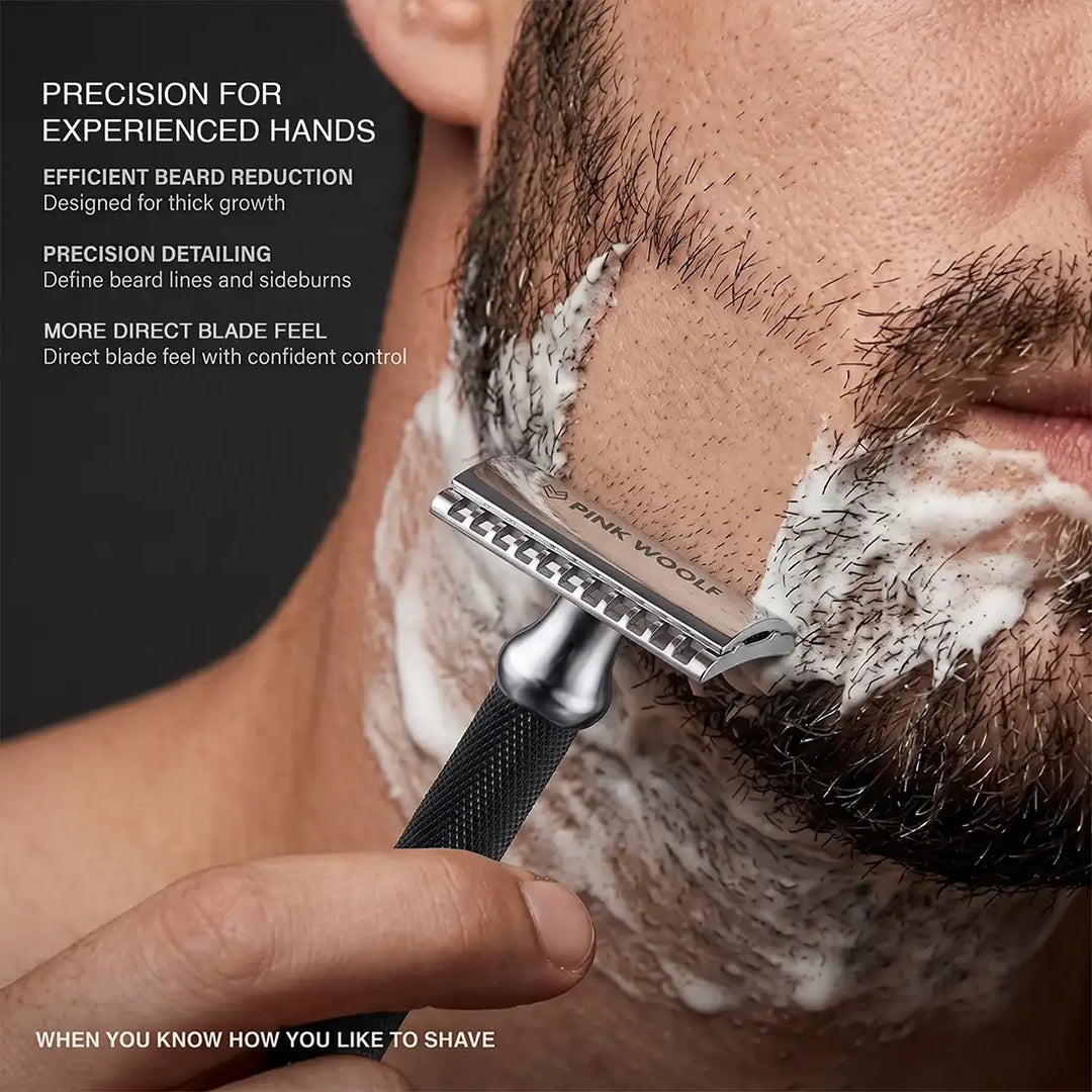 Pink Woolf OC70 open comb safety razor in use for precise beard reduction and experienced wet shaving
